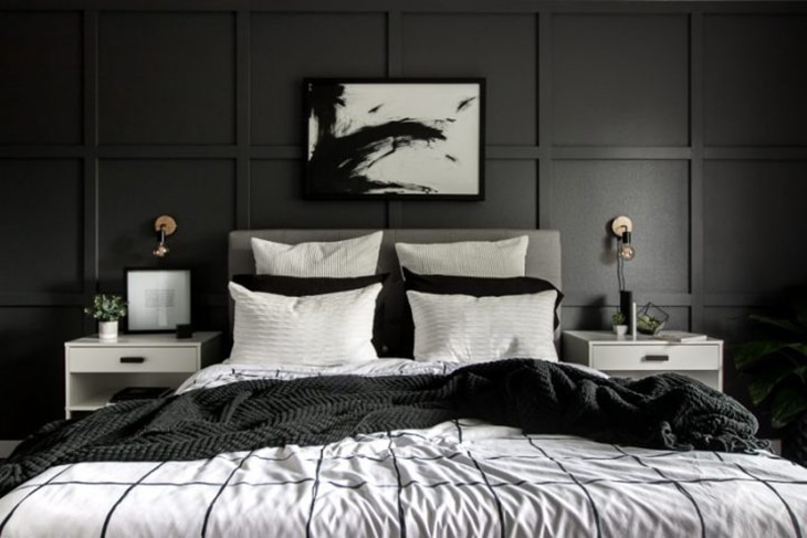 Modern dark board and batten accent wall in a bedroom