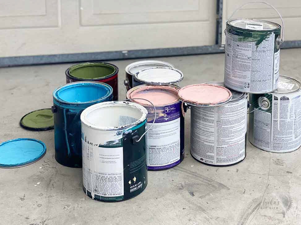 paint cans on garage floor