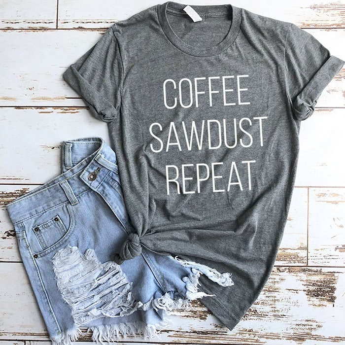 Woman wearing coffee sawdust repeat t-shirt