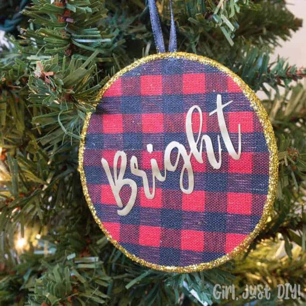 Plaid ornament with "Bright" added using Cricut