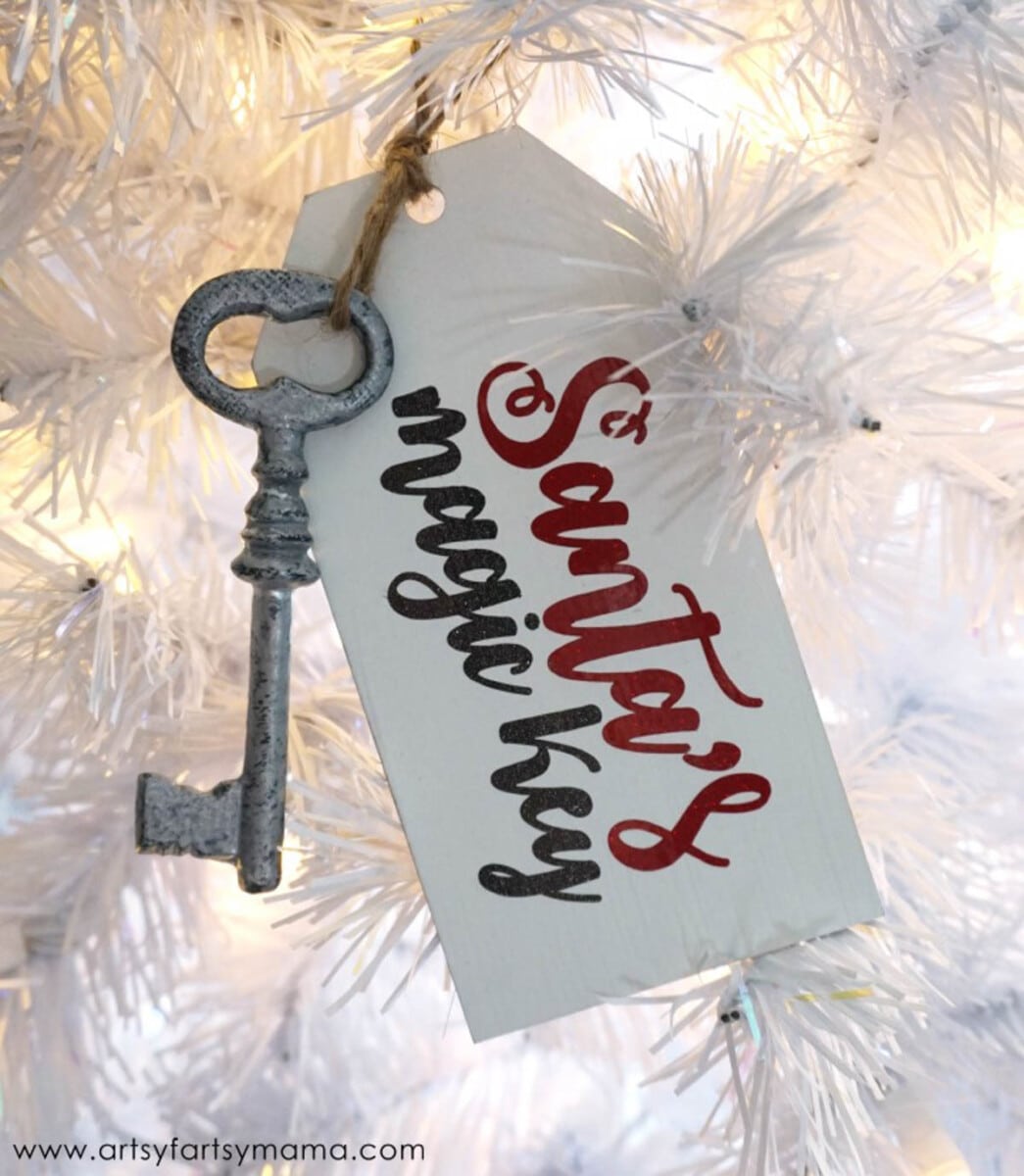 Cricut Christmas ornament in the shape of a gift tag with a key "Santa's magic key"