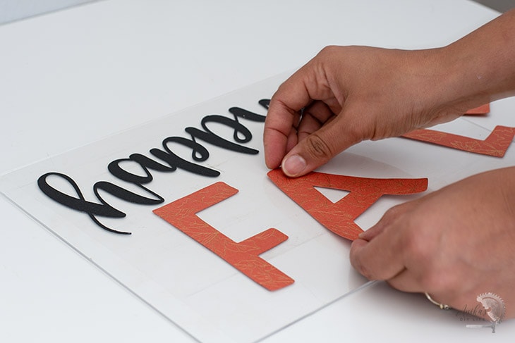 Applying letters to plexiglass