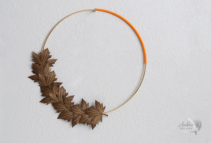 DIY minimal and modern fall hoop wreath on wall