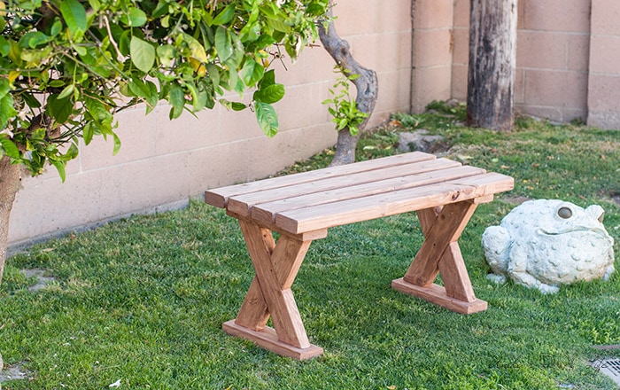 DIY 2x4 bench outdoors on the grass 