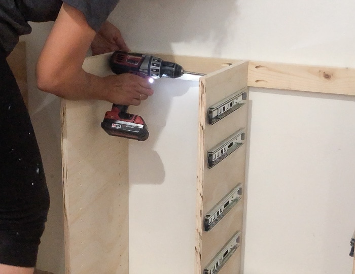 Attaching the closet to the wall 