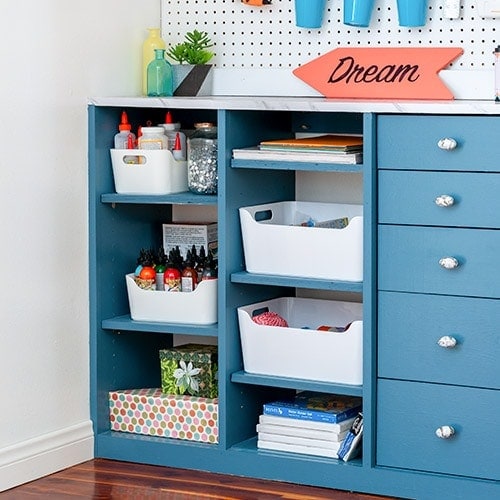 Learn how to build your own custom DIY craft closet organizer with drawers with these full plans, step by step tutorial and video. Turn any closet into the perfect organized craft closet.