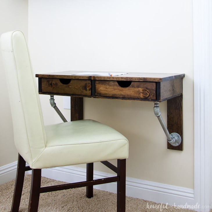 DIY wall mounted industrial desk with pipe detail and two drawers