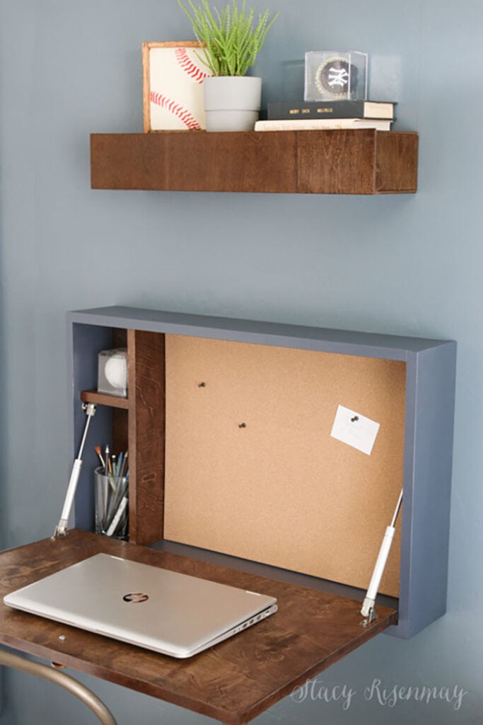 Fold down desk with storage and bulletin board inside
