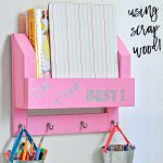Scrap wood DIY desk organizer on the wall with text overlay