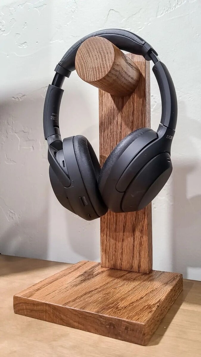 DIY wood headset stand with headset hanging on it 