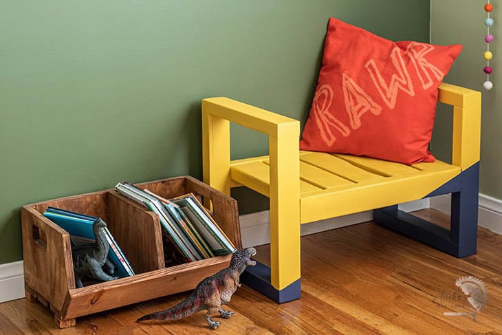 DIY kids modern bench seat painted yellow with red pillow 