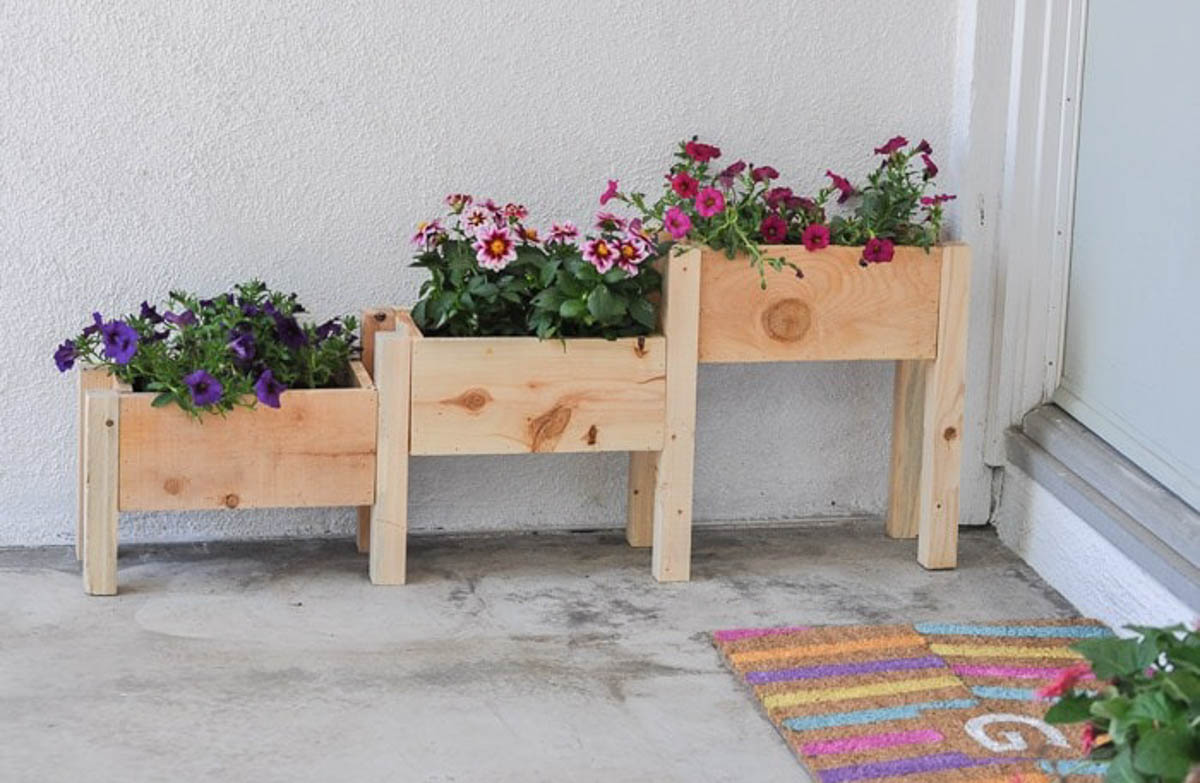 DIY three tiered planter box with flowers