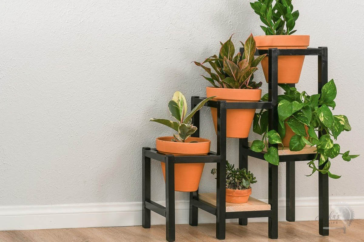 Tiered metal plant stand with spaces for five plant makes a great DIY gift for plant lovers