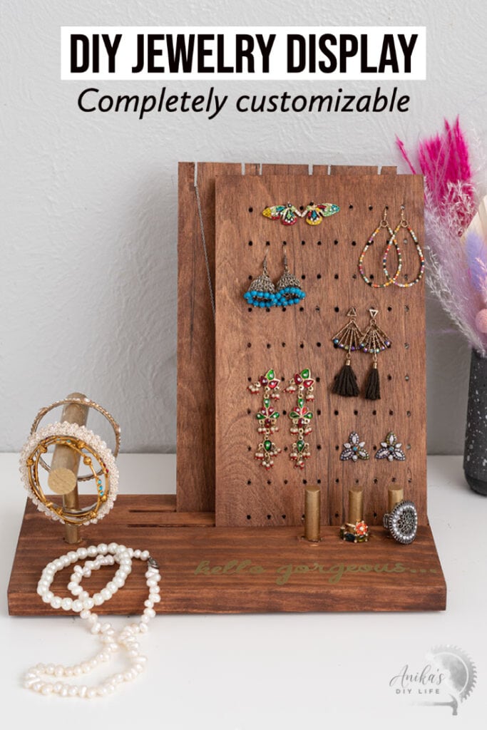 DIY Jewelry holder with jewelry on a table with text overlay