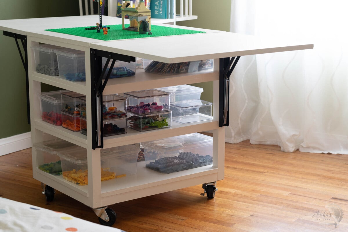 Lego storage cart with sides open.