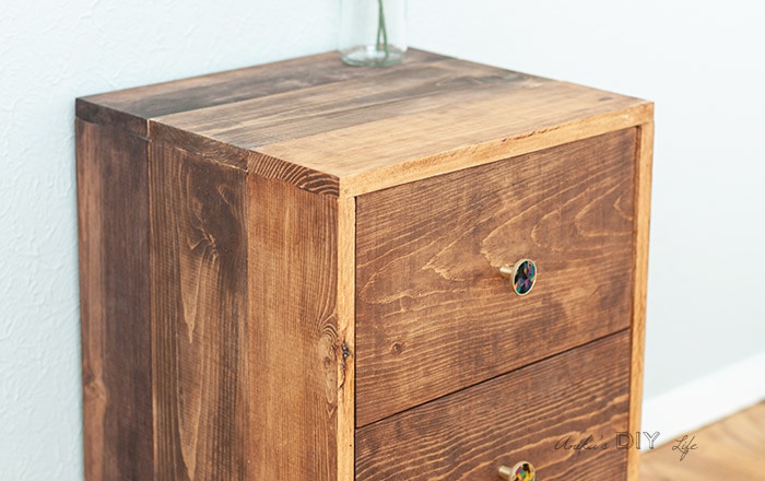 Close up of side of the simple DIY nightstand with drawers