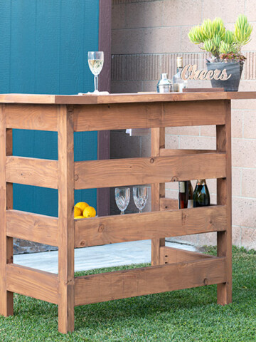 Learn how to build a wooden DIY outdoor bar perfect for any deck, patio or porch with step by step tutorial, plans, and video.