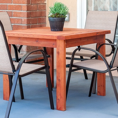Learn how to make a simple DIY outdoor dining table with full plans, tutorial, and video. This DIY Outdoor table uses only structural 2x4 and 2x6 lumber and costs $20!