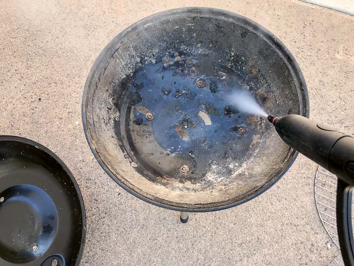 Cleaning the old charcoal grill using steam and no chemicals