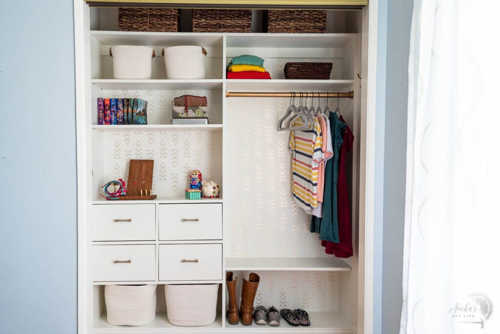 DIY Closet organizer with drawers in a reach in closet with sliding doors