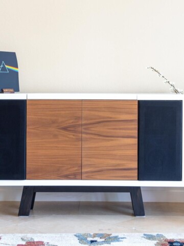 Learn how to build an amazing DIY record player stand with space for speakers and storage for vinyl records with detailed tutorial and plans.