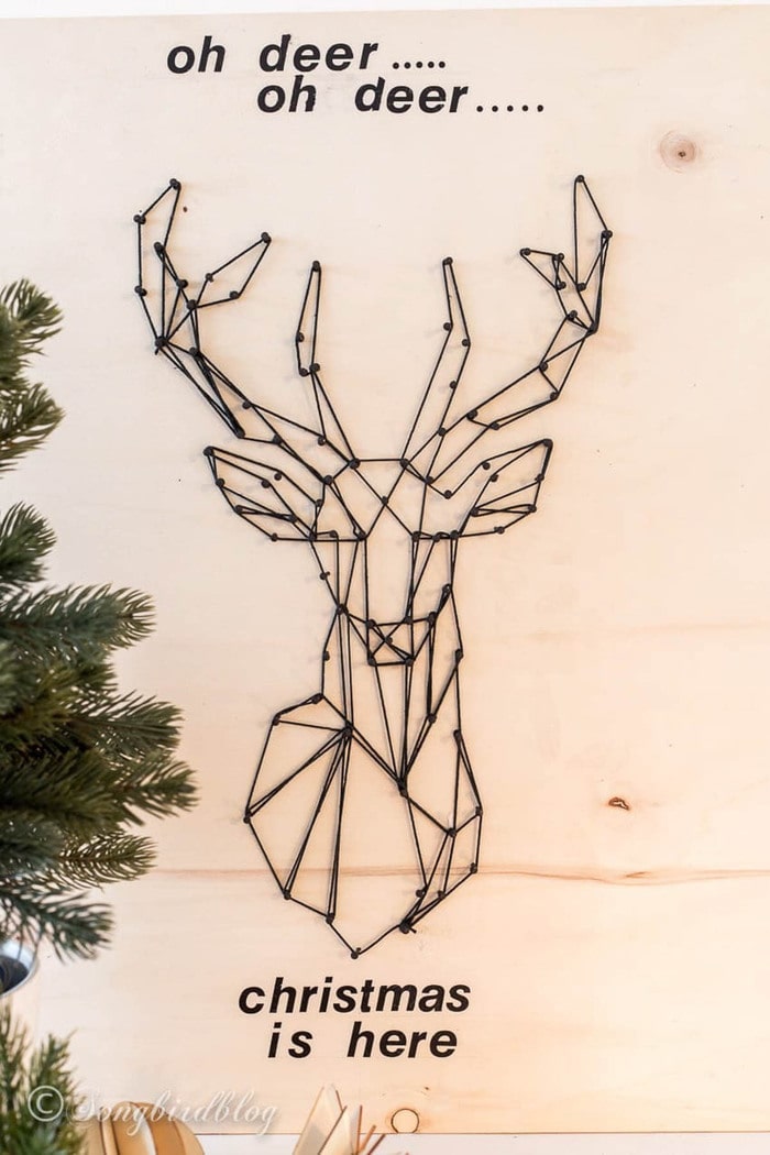 deer made using string art on scrap plywood