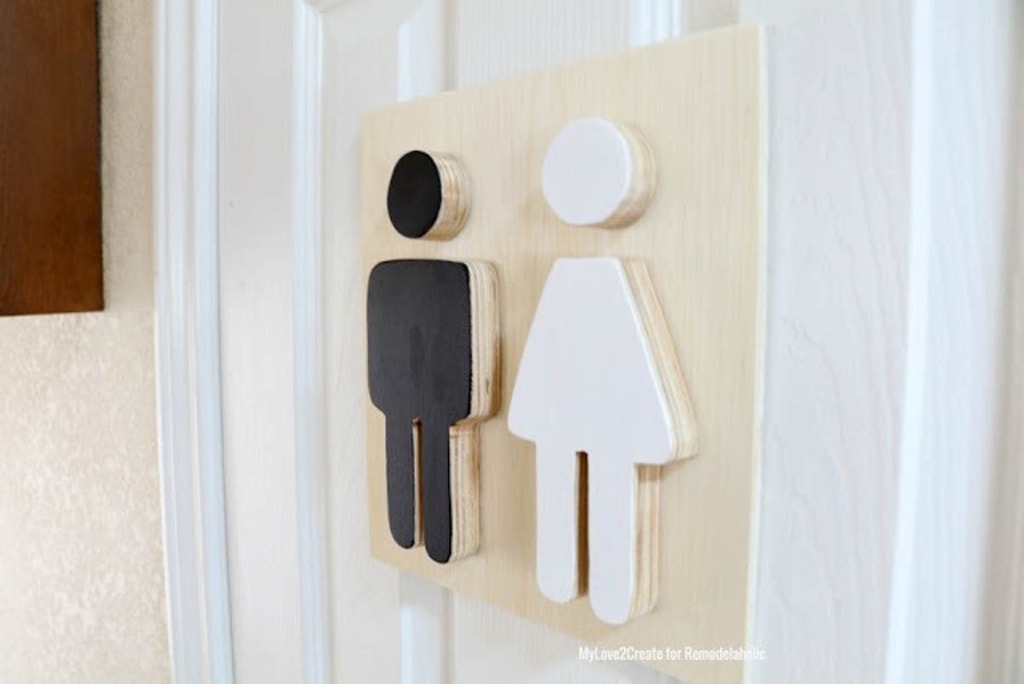 Boy/girl restroom signs made from scrap plywood