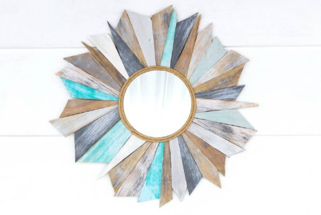 sunburst mirror made from scrap plywood with a weathered beachy finish