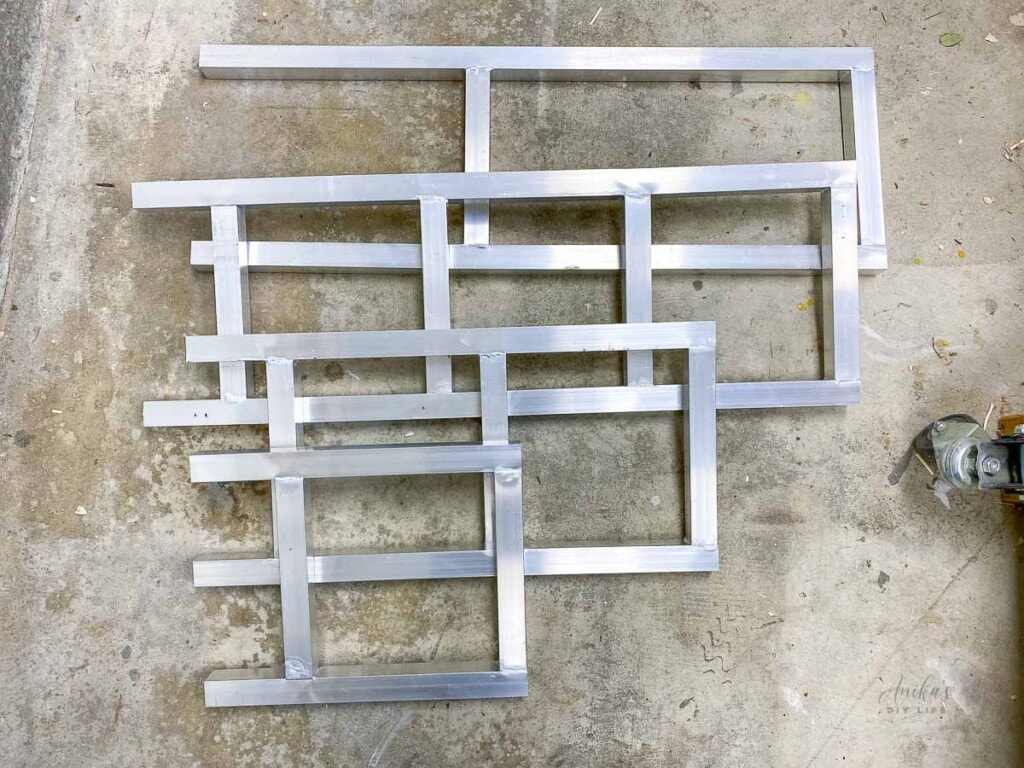 Brazed aluminum frames on workshop floor