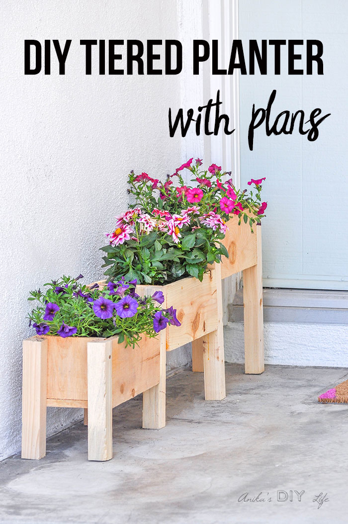 DIY Tiered planter filled with flowers on front porch with text overlay