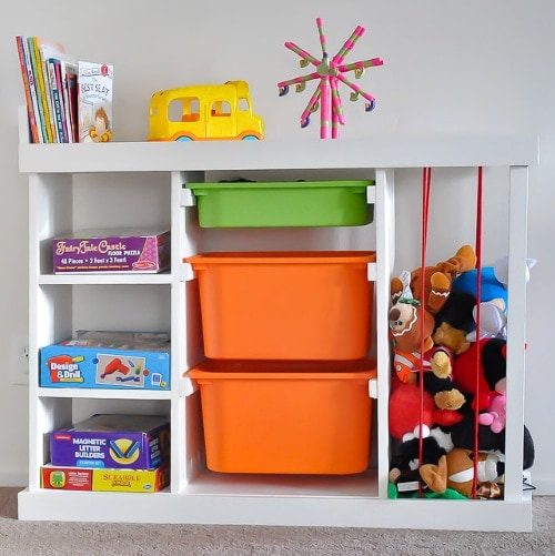 The perfect DIY toy organizer you have been looking for! Easy to build and a spot for stuffed toys, books, board games and all those big and small toys.