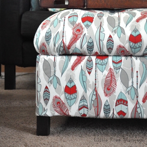 Make your own DIY upholstered storage ottoman. This step by step tutorial shows you how to build an ottoman with basic tools and how to cover an ottoman in fabric. Also includes DIY storage ottoman plans so you can make your own upholstered ottoman easily.