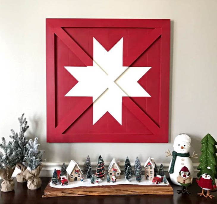 Red barn quilt with white star
