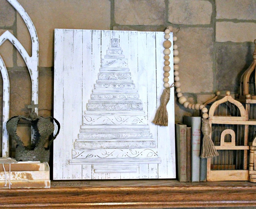White wood Christmas tree made from molding on wood board