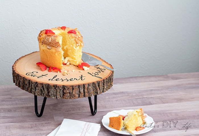 DIY wood slice cake stand on table with cake
