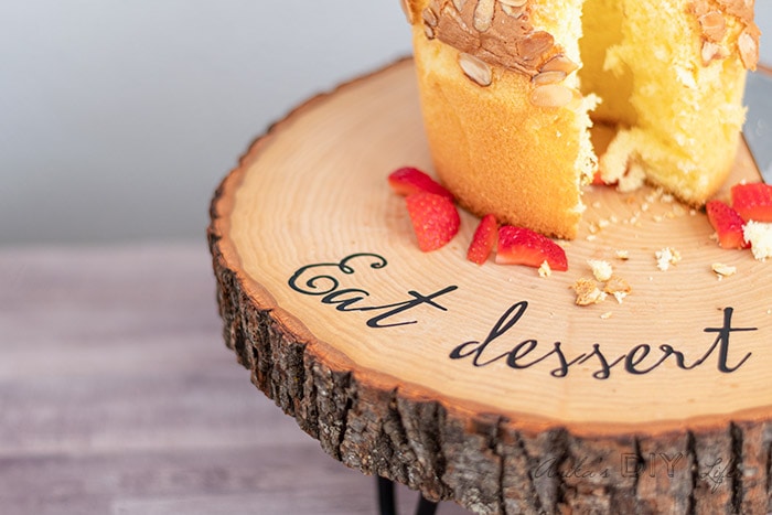 close up of letters on DIY wood cake stand