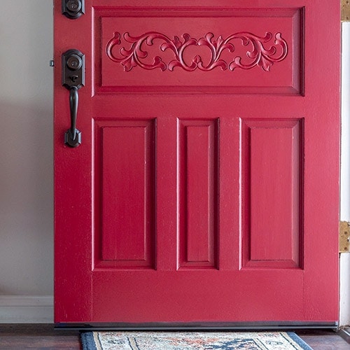 A step-by-step tutorial and supplies list to show you how to paint a front door the quick and easy way without removing it from the hinges.