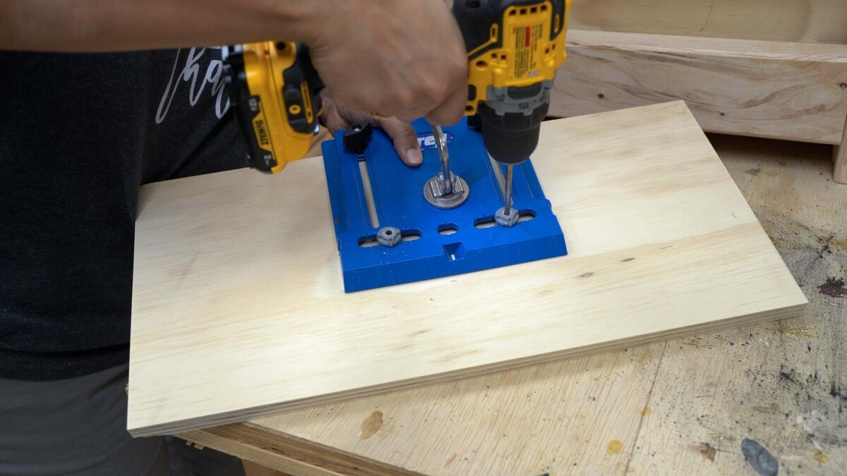 Adding the drawer hardware holes using a jig