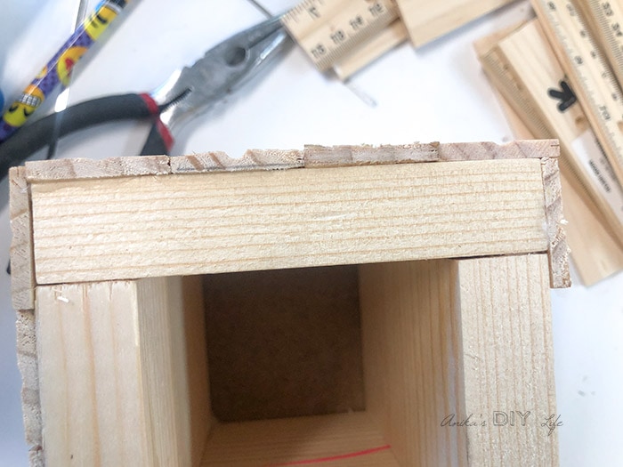 close up of the edge of the diy wooden pencil holder 