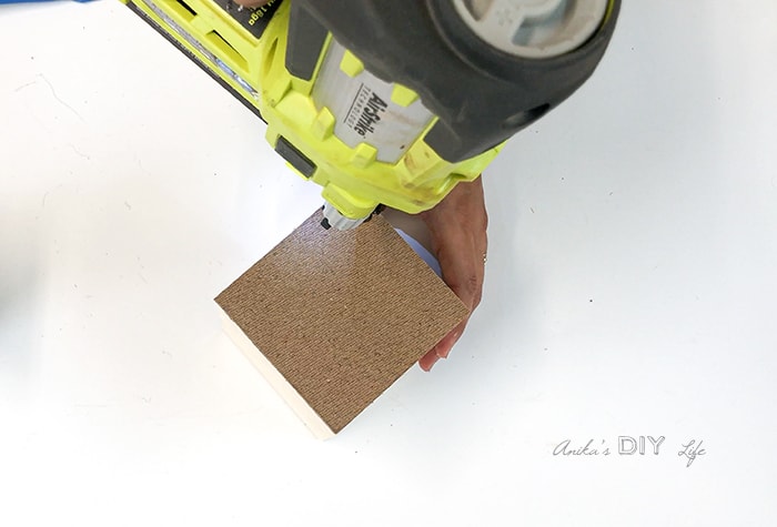 Attaching bottom to wooden pencil holder using brad nailer