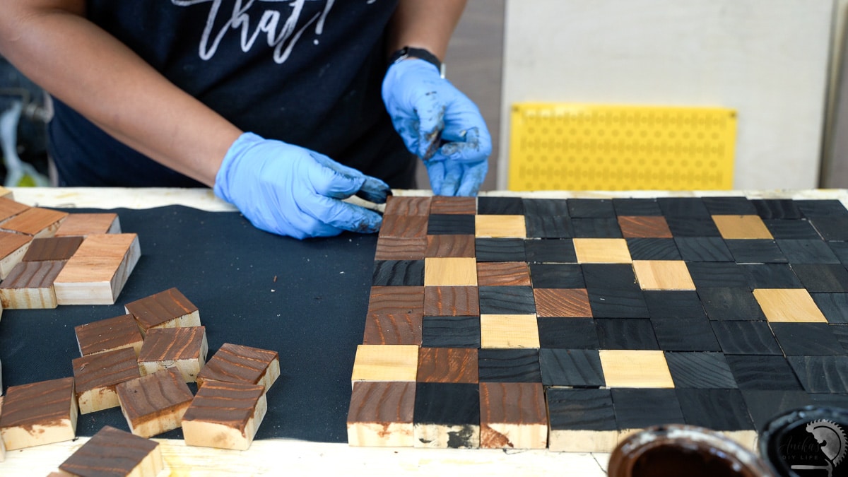 staining scrap wood blocks in black and brown