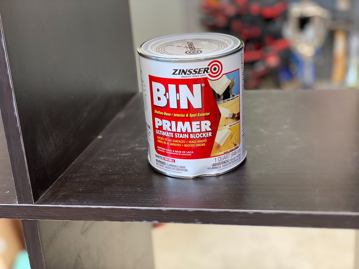 Close up shellac-based primer for painting laminate furniture