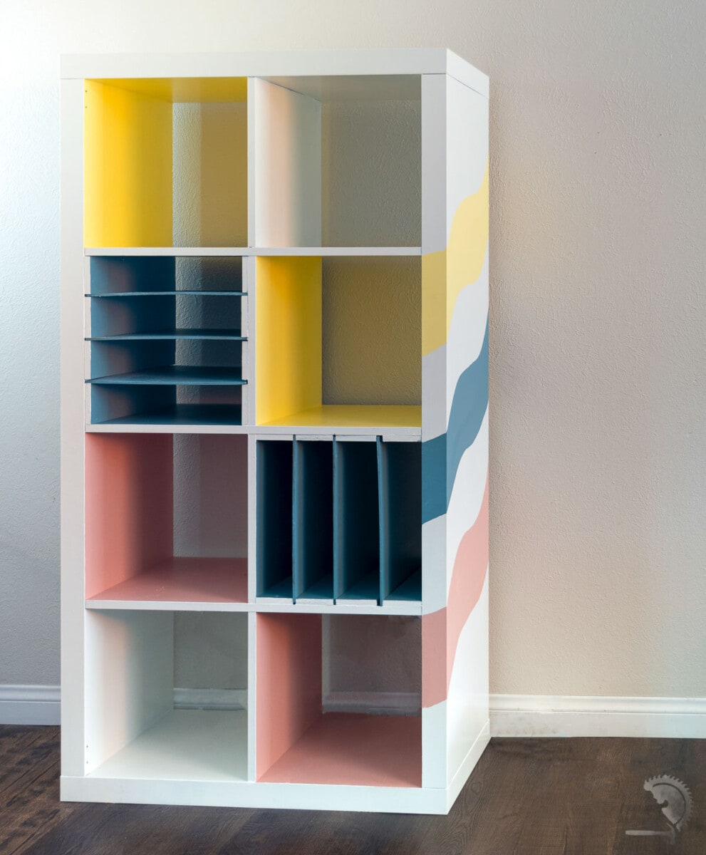 Painted Ikea laminate bookshelf in room