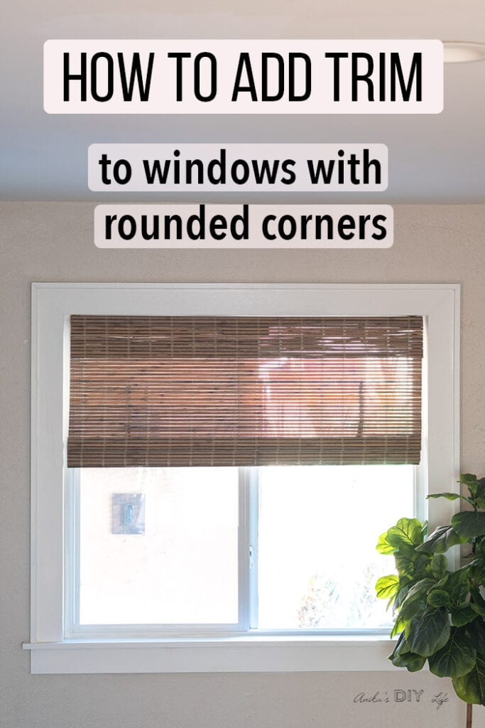 Window with DIY window trim and text overlay