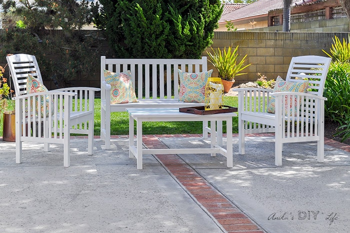 white painted wood furniture in patio