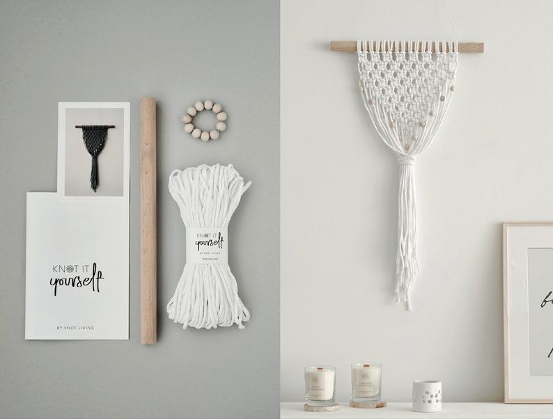 macrame wall hanging with supplies pictured next to it