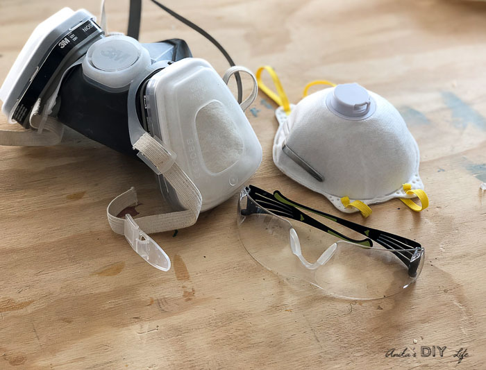 Ventilator, dust mask and safety glasses needed for protection while painting furniture
