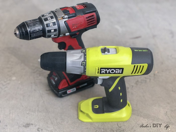 Two cordless drill on workshop floor